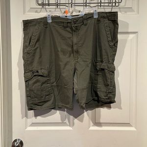 Green and beige cargo shorts